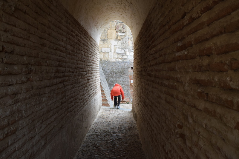 history, day, the way forward, alley, built structure, building exterior, light at the end of the tunnel, rear view, walking, stone wall, outdoors, wall - building feature