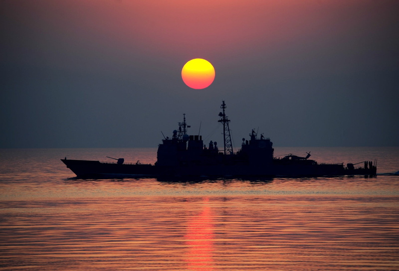 navy, beauty in nature, mission, nature, tranquility, vessel, twilight, outdoors, dusk, reflection, tranquil scene, sea, silhouette, sky, transportation