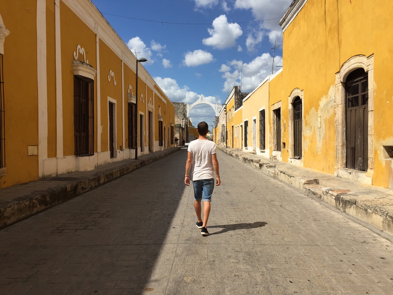 human, sidewalk, person, built structure, 2K, concrete, pavement, sky, day, road, leisure activity, building exterior, pedestrian, izamal, architecture