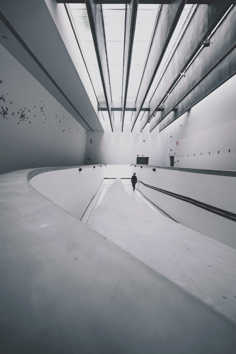 inside, architecture, person, leisure activity, walkway, wide angle, geometry, beside, men, incidental people, museo maxxi, black and white, real people