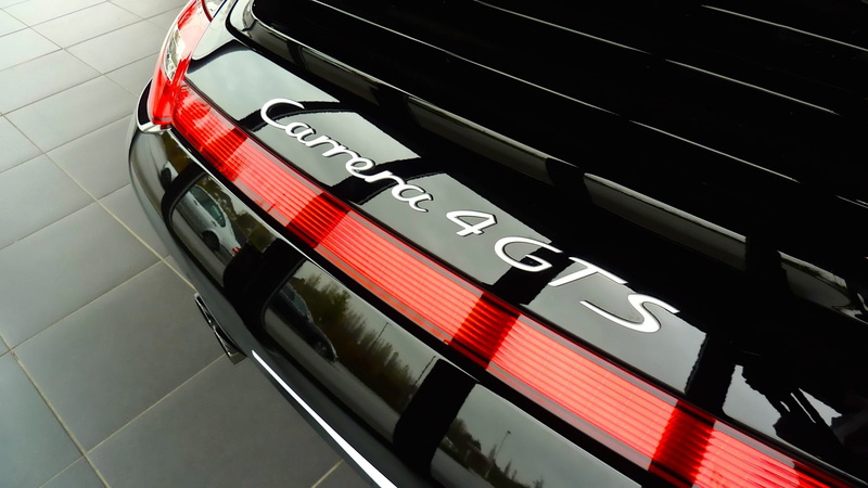 motor vehicle, indoors, Auto, high angle view, shiny, close-up, mode of transportation, black color, red, style, Automotive, design, fuel and power generation