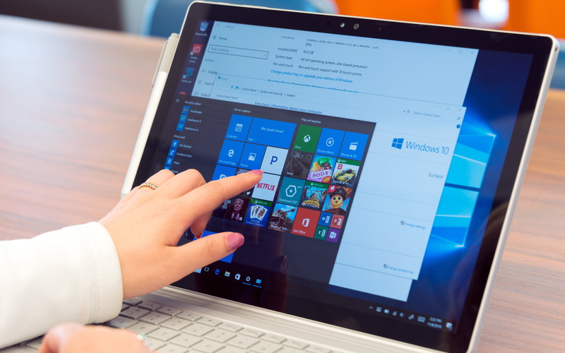 one person, laptop, adult, indoors, wireless technology, computer, human hand, communication, finger, table, portable information device, microsoft, connection