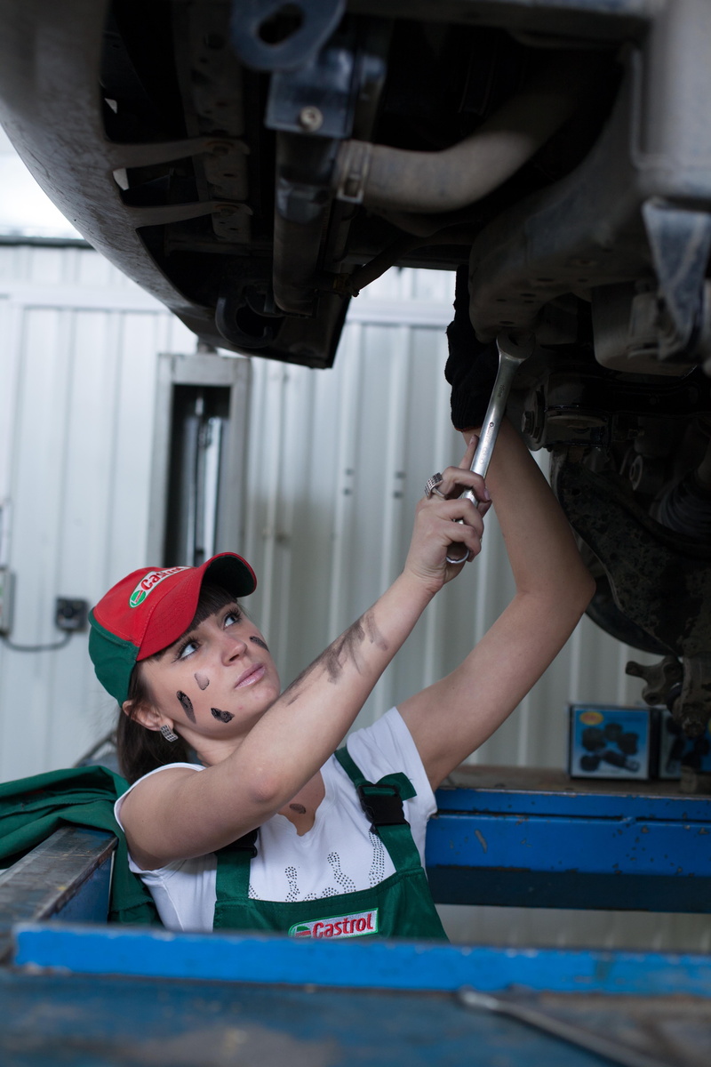 castrol, headshot, lifestyles, occupation, men, woman, portrait, childhood, boys, males, repair, uniform, child, mouth open, front view, indoors, leisure activity