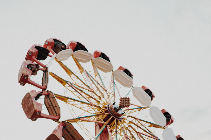 low angle view, amusement park ride, funfair, carousels, sky, vacations, vintage, clear sky, ferris wheel, ride, nature, amusement park, feast, no people