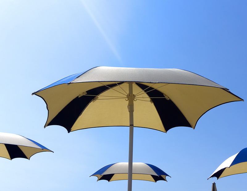 low angle view, nature, relax, beach umbrella, protection, shadow, parasols, blue sky, blue, summer, safety, environment, screen, sun, day, parasol, security