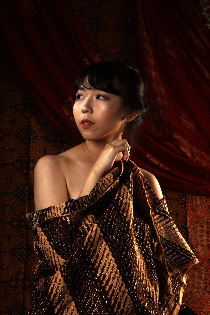 lifestyles, portrait, young adult, fashion, looking at camera, batik, beautiful woman, front view, bangs, looking, 5K, indoors, one person, contemplation