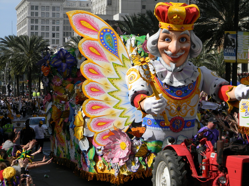 human representation, day, representation, built structure, statue, mardi, french quarter, float, art and craft, multi colored, looking at camera, creativity