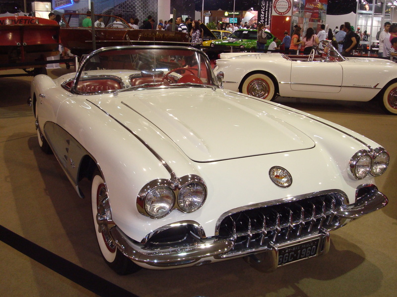 corvette c1 1960, mode of transportation, vintage car, chevrolet, headlight, day, incidental people, vehicle hood, luxury, city, architecture, land vehicle