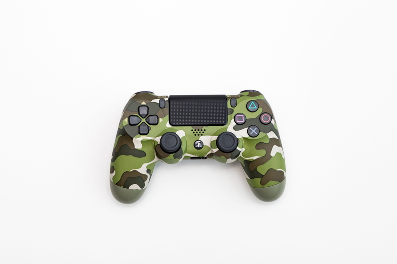 play, fun, connection, no people, retro styled, still life, creativity, single object, number, green color, technology, console, camo, close-up, indoors