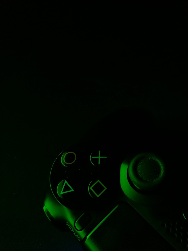 black background, communication, illuminated, power supply, studio shot, ps4, road, digital clock, green color, playstation contreller, fuel and power generation