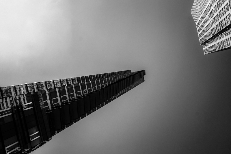 copy space, in a row, building exterior, high rise, sky, town, white, low angle view, tree, tilt, wall - building feature, tower, clear sky, no people