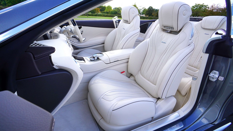 outdoors, chair, day, land vehicle, machine, comfortable, steering wheel, vehicle seat, modern, dashboard, travel, design, nature, motor vehicle, window