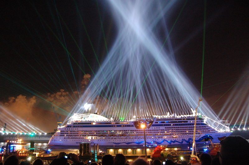 light, light beam, travel destinations, lighting equipment, stage, enjoyment, transportation, arts culture and entertainment, cruise ship, motion, group of people
