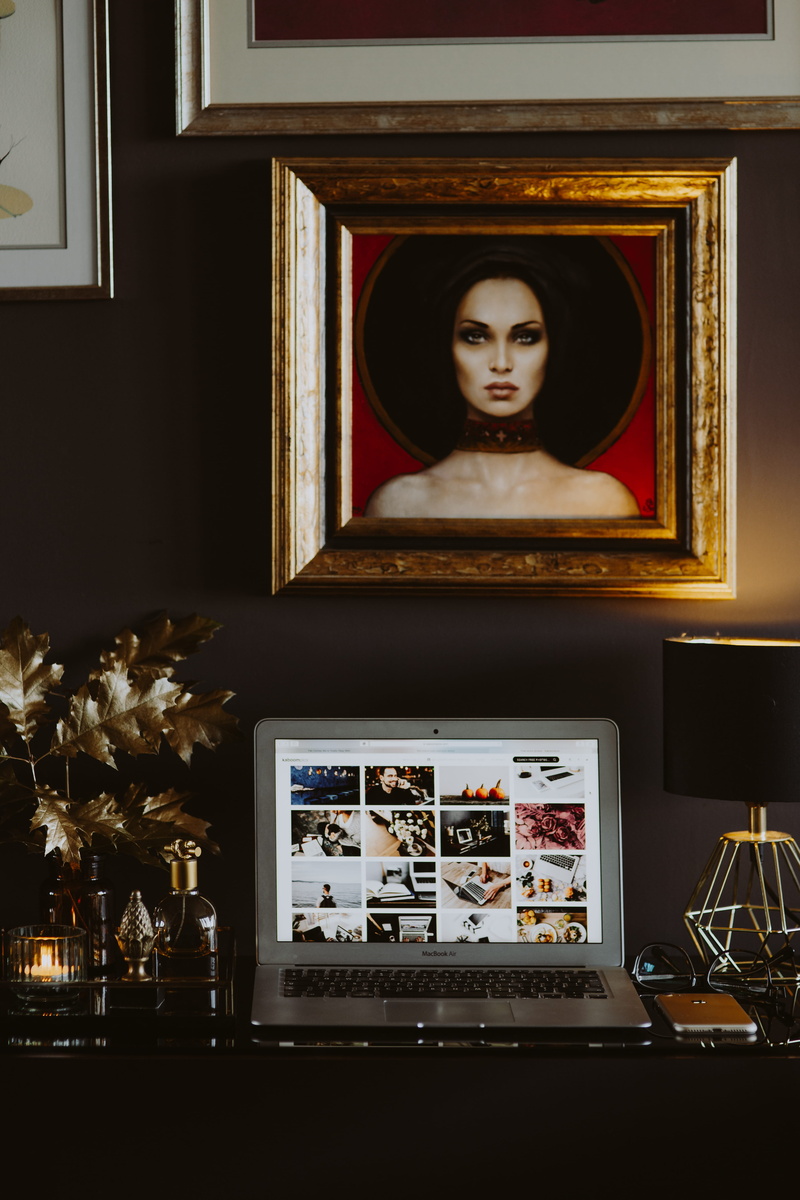 interior, golden, workspace, beautiful woman, laptop, one person, table, indoor, macbook, phone, home office, technology, gold, picture frame, female likeness