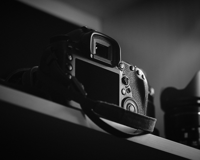 technology, selective focus, wristwatch, table, pattern, top, photography, strap, design, single object, light, product, railing, still life, viewfinder