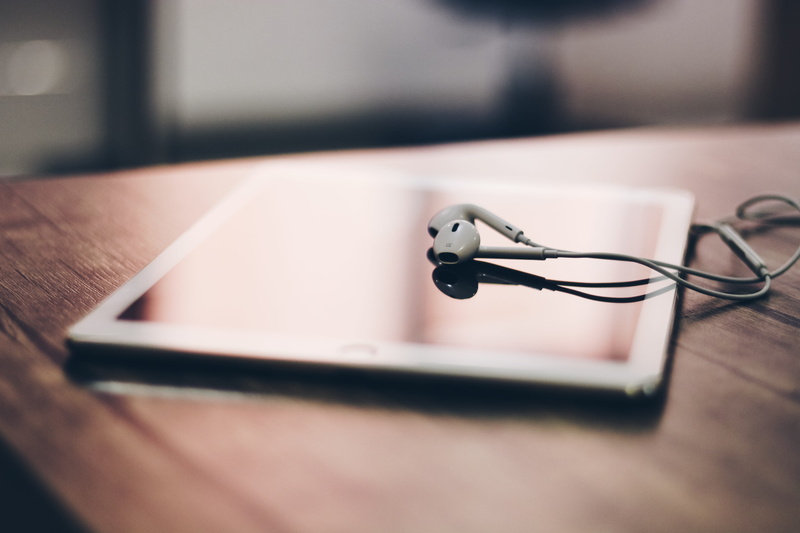 technology, no people, key, wood - material, still life, cable, gadget, table, earpods, eyeglasses, wireless technology, close-up, desk, tablet, screen
