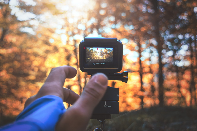 taking, photography themes, one person, photographing, outdoors, land, trees, technology, person, wireless technology, video, modern, device, holding, display