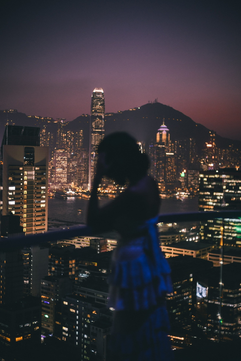 facing, forehead, time, buildings, water, financial district, office building exterior, standing, building, hill, nature, rail, city life, city, architecture