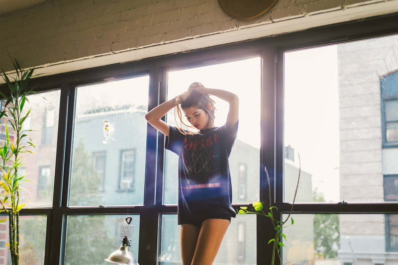 women indoors, hairstyle, window, real people, standing, hands in hair, indoors, young adult, architecture, arms raised, brunette, women, glass - material