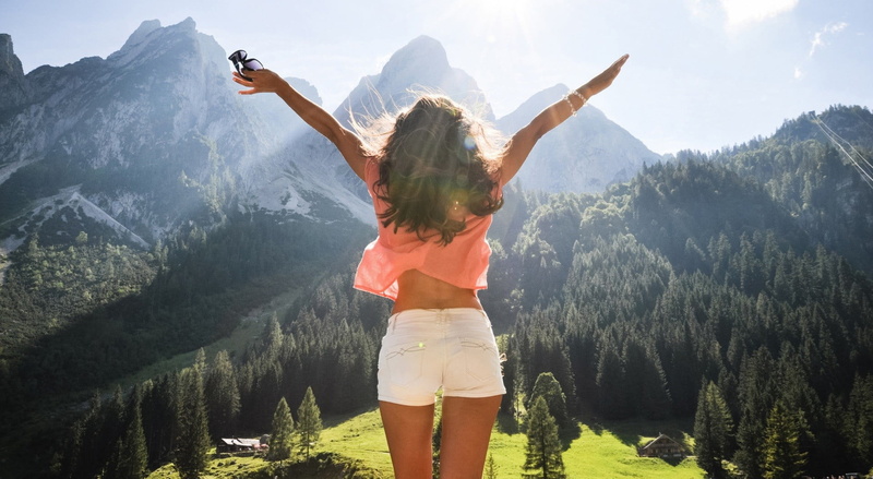 beauty in nature, limb, woman, Sunny, hair, tree, spreading, hands, human arm, wavy hair, standing, model, vacations, arms up, scenics - nature, one person