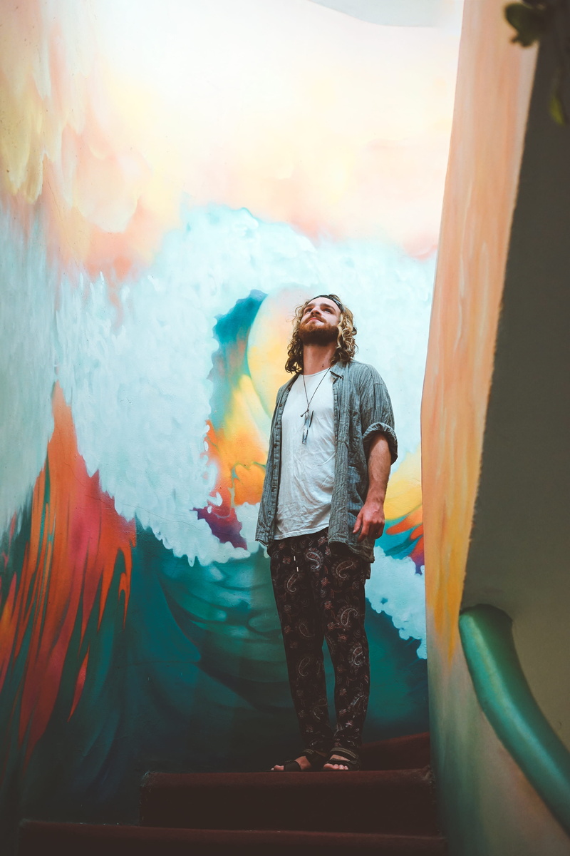 front view, leisure activity, explore, gray, outdoors, nature, looking up, male, paunting, staircase, hipster, blue, art, going down, going up, water, day