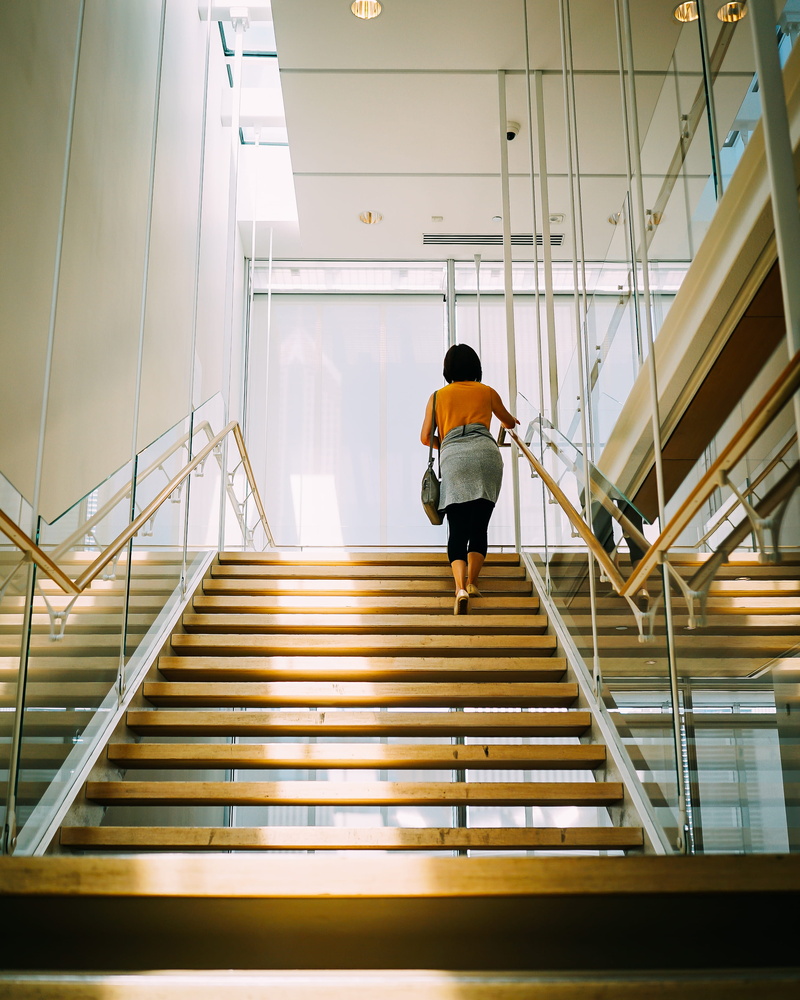 steps, low angle shot, ceiling, casual clothing, stair, one person, rear view, light, stairs, moving up, design, daylight, low angle view, the way forward