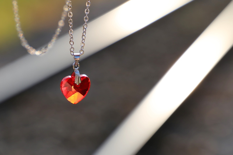 decoration, personal accessory, red heart medallion on railway, education can kill, peer pressure, stop abuse in schools, bad marks, bead, positive emotion