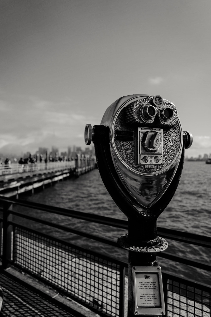 monochrome, railing, coin operated telescope, day, sea, operated, close-up, telescope, coin, skyscraper, sky, water, tourist spot, building exterior, sight