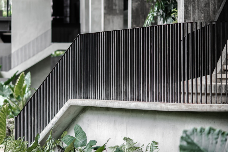 handrails, railing, plants, staircase, building, plant part, built structure, fuel and power generation, alternative energy, metal, focus on foreground