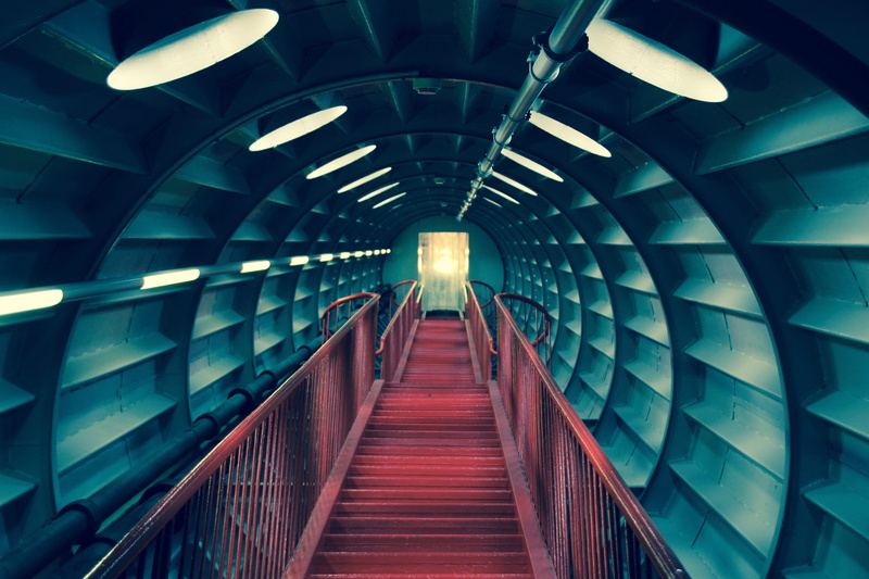 ceiling, tube, men, railing, built structure, stairway, diminishing perspective, bruxelles, connection, lifestyles, real people, illuminated, transportation