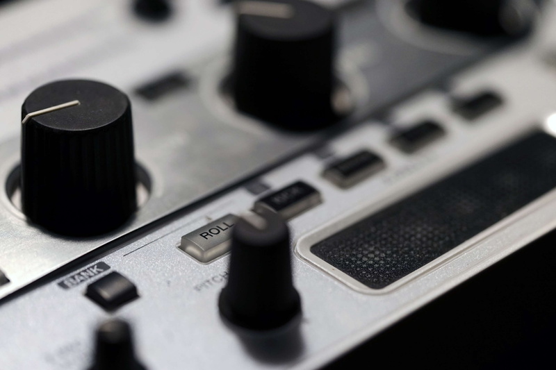 listening, selective focus, indoors, communication, industry, arts culture and entertainment, te, disco, analog, deejay, high angle view, sound recording equipment