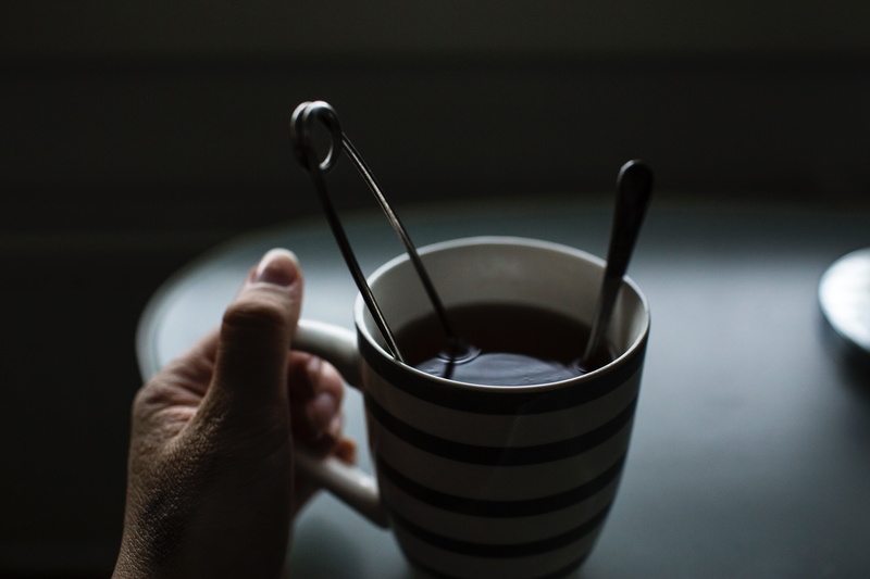 household equipment, 5K, holding, human body part, water, blur, coffee - drink, tea cup, dark, spoon, close-up, human hand, cup, person, safety, table
