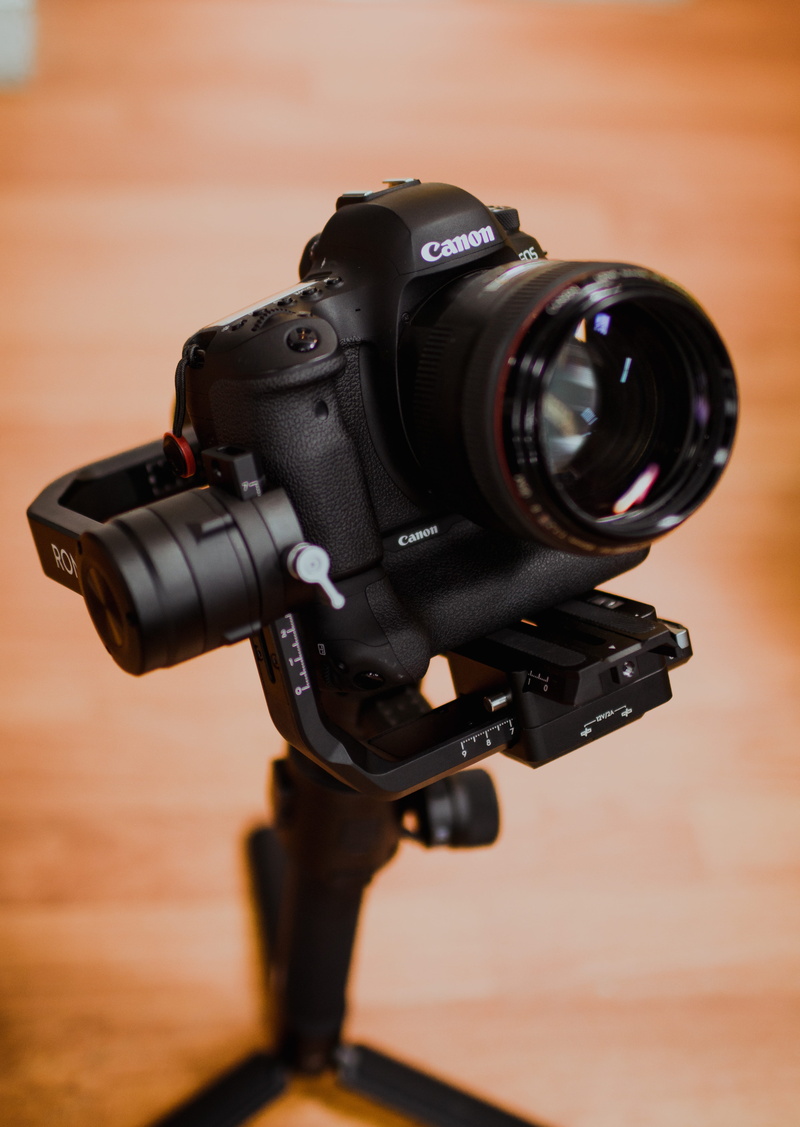 no people, lenses, gear, lens - optical instrument, background, photography, still life, equipment, focus on foreground, modern, tripod, camera lens, zoom