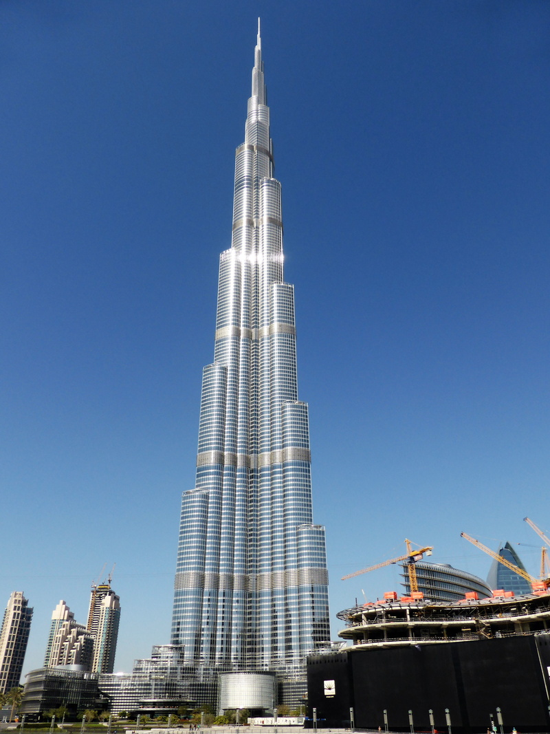 tower, dubai, modern, outdoors, travel destinations, low angle view, built structure, building exterior, architecture, financial district, city, building