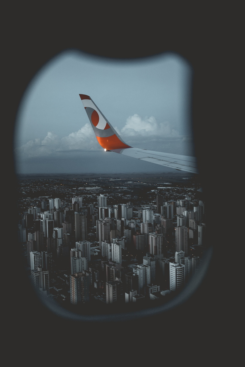 stratosphere, engine, nature, built structure, building exterior, city, mode of transportation, window, air, business, aircraft Wing, sky, building, no People