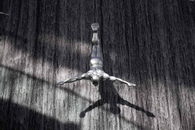 muscles, full length, dubai mall, stunt, art, metal, heads, gymnastic, shadow, directly above, wood - material, wide, light, cliff jump, plunge, swim, still life