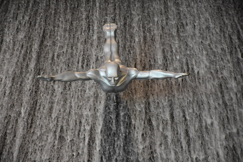 strength, skill, close-up, outdoors, metal, white color, dubai mall, no people, low angle view, mall, emirates, representation, animals in the wild, wall - building feature