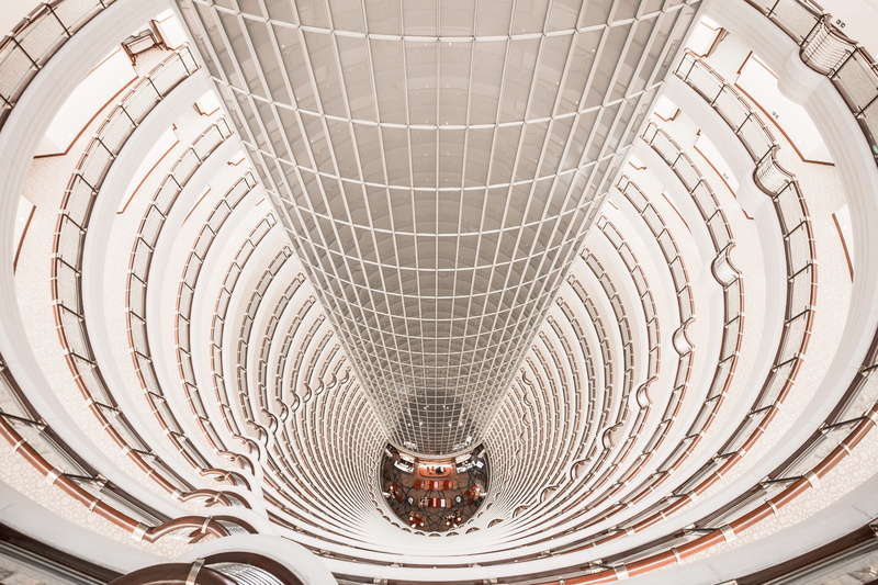 architectural feature, pattern, design, concentric, ornate, built structure, shape, luxury, circle, indoors, skyscraper, modern, curve, no people, perspective