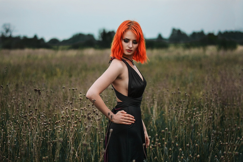 2K, women outdoors, black dress, sideboob, women, portrait, hands on hips, redhead