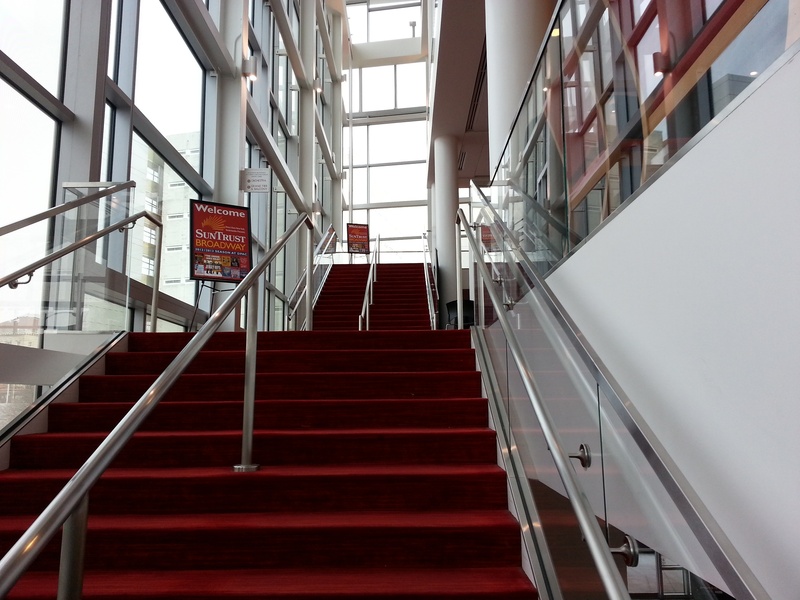 moving up, theater, transportation, show place, pac, day, indoors, durham, the way forward, low angle view, convenience, railing, window, built structure