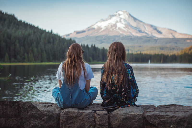 friends, wall, two people, outdoors, long hair, teenager, looking at view, friendship, water, togetherness, woodland, scenics - nature, vacations, mountain range