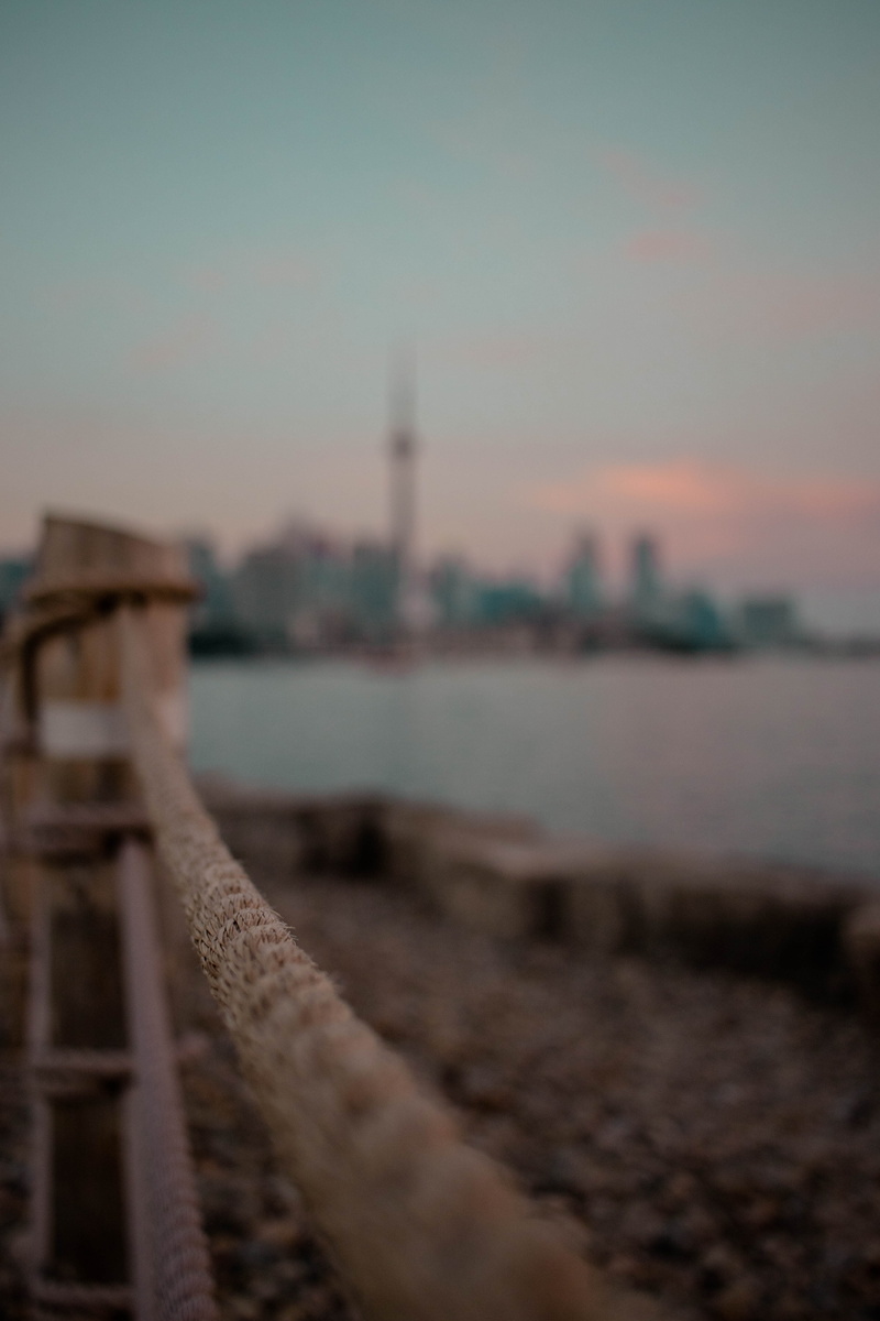 sunset, trillium park, tower, skyline, railing, lake, sea, travel destinations, toronto, city, depth of field, canada, office building exterior, closeup