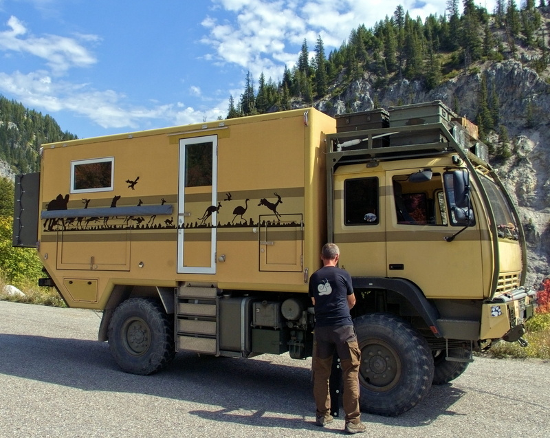 land vehicle, transportation, transport, men, caravan, full length, recreational, nature, real people, journey, expedition vehicle, tree, vehicle, wyoming