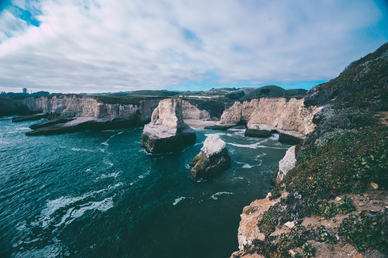 beach, steep, scenics, vertical, walls, tranquility, formation, water, cliff, seaside, non-urban scene, solid, cloud - sky, dramatic, land, tranquil scene