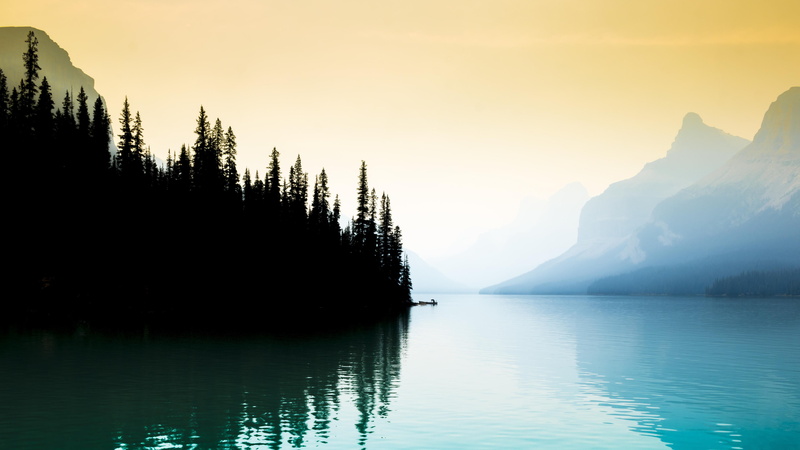 lake landscape mist mountains pine trees boat alberta lake maligne, 4K