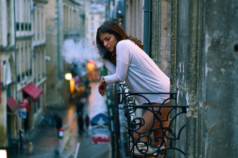 long hair, balcony, young adult, infrastructure, architecture, 4K, casual clothing, beautiful woman, building exterior, real people, terrace, lifestyles