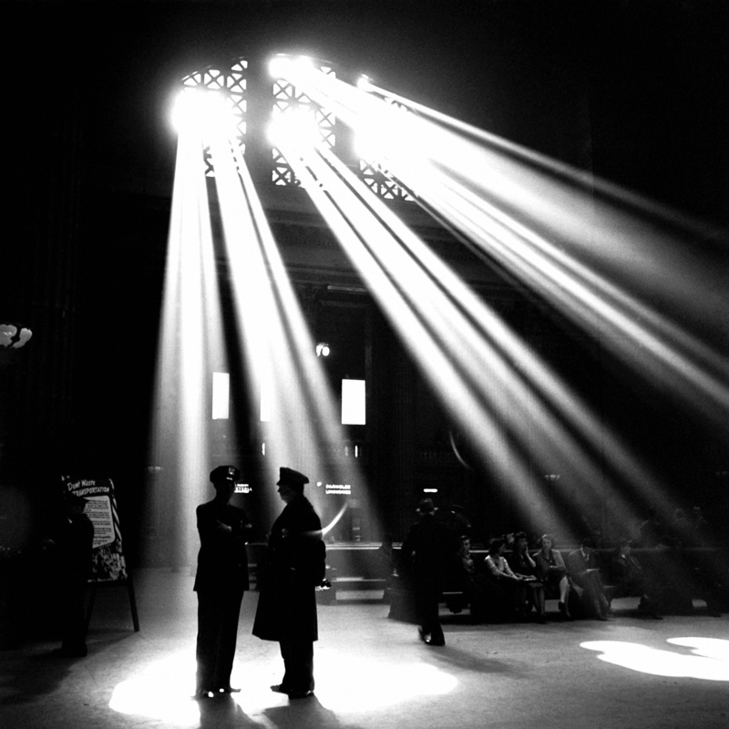 lighting equipment, spotlight, adult, inside, silhouette, 1941, light, illuminated, lifestyles, indoors, performance, people, light beams, black and white