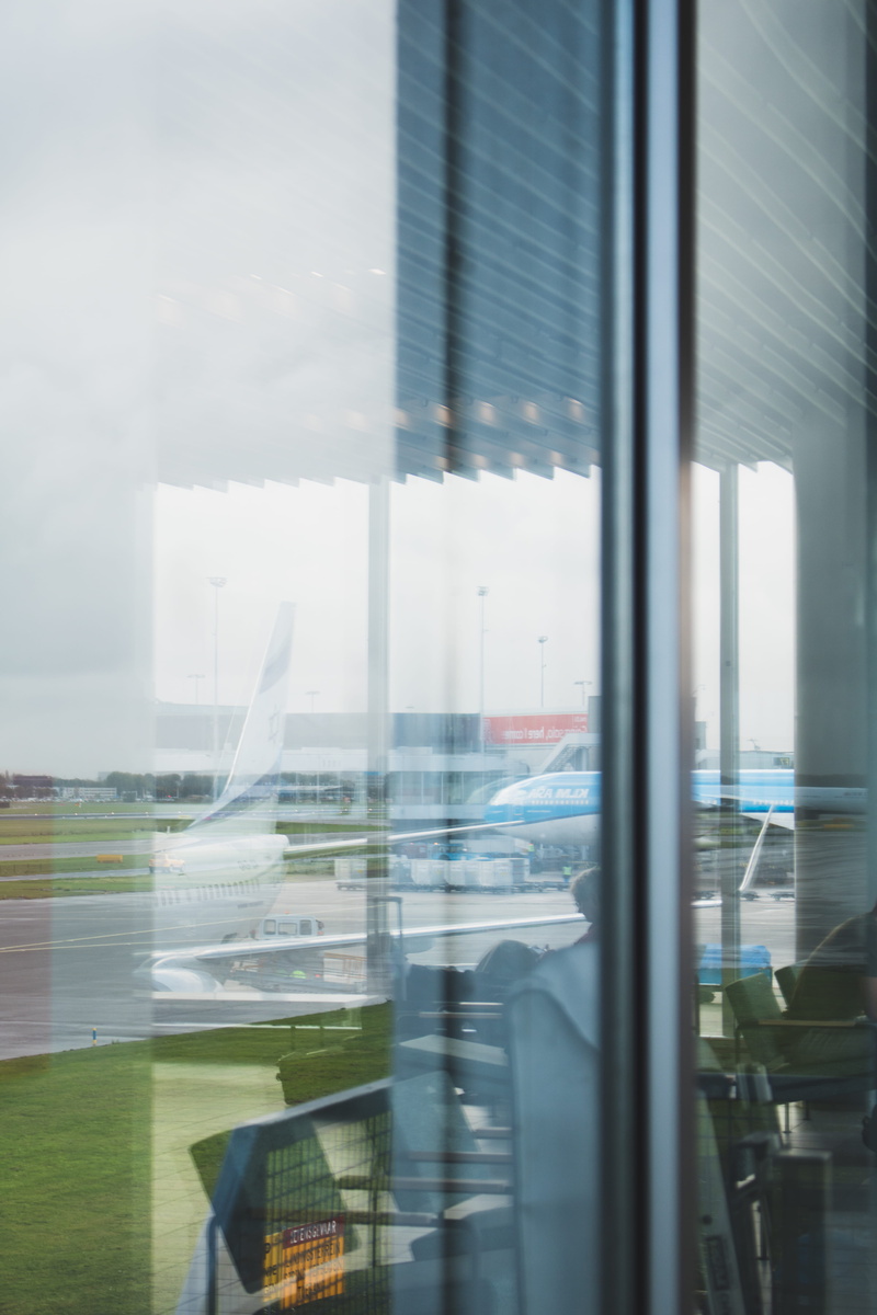 glass, transparent, no people, outdoors, blurred motion, aerospace industry, floor, wall, glass - material, amsterdam, built structure, schiphol airport