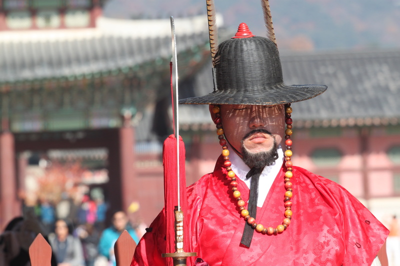 4K, spear, incidental people, travel, seoul, red, real people, heritage, clothing, focus on foreground, soldier, traditional clothing, hat, korea, men