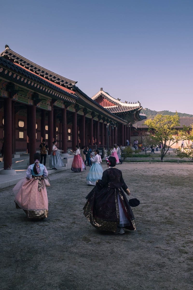 seoul, built structure, travel destinations, clothing, men, building exterior, south korea, real people, architecture, building, korea, sky, travel, trees